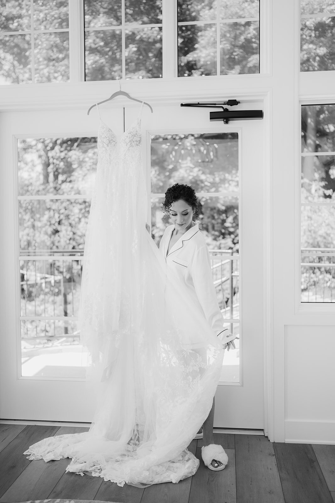 bride gets herself ready for her wedding day