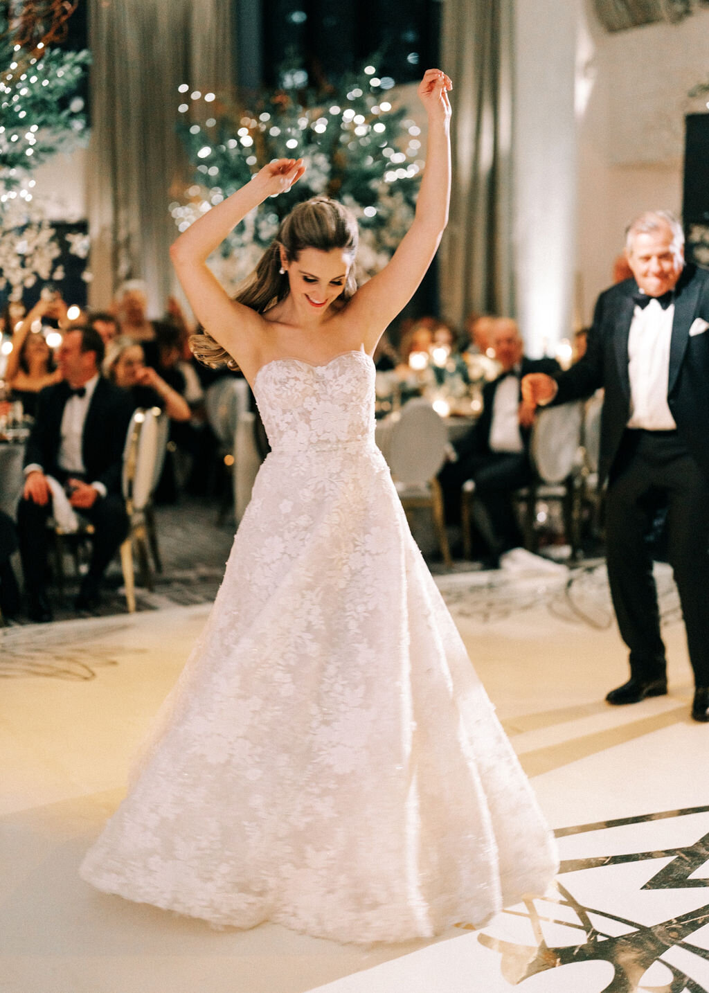 A lively picture of the bride on the dance floor. 