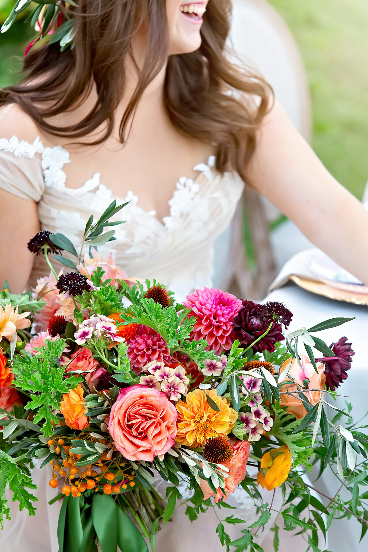 Close-up of luxury bridal bouquet details with colorful accents at Tuscan dream wedding