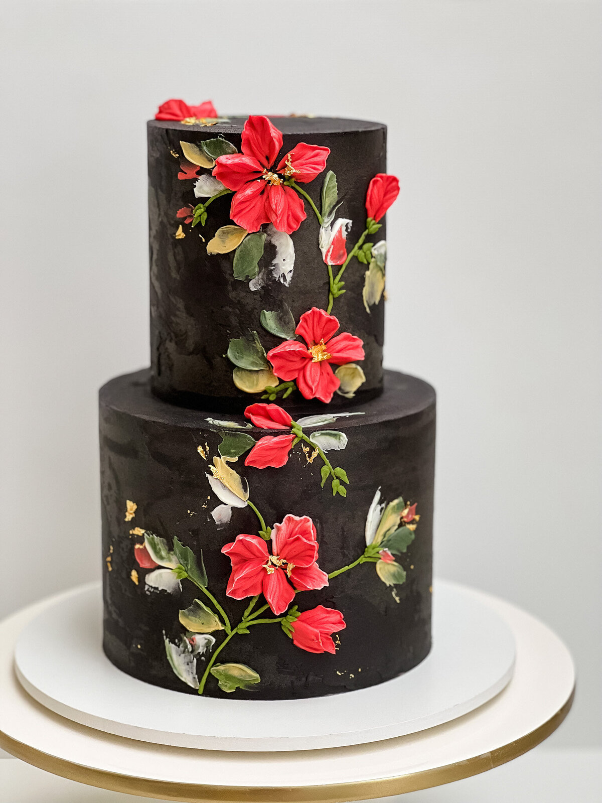 black buttercream flower wedding cake