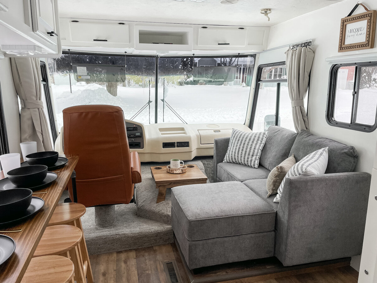 RV front L-shaped couch in place of passenger seat