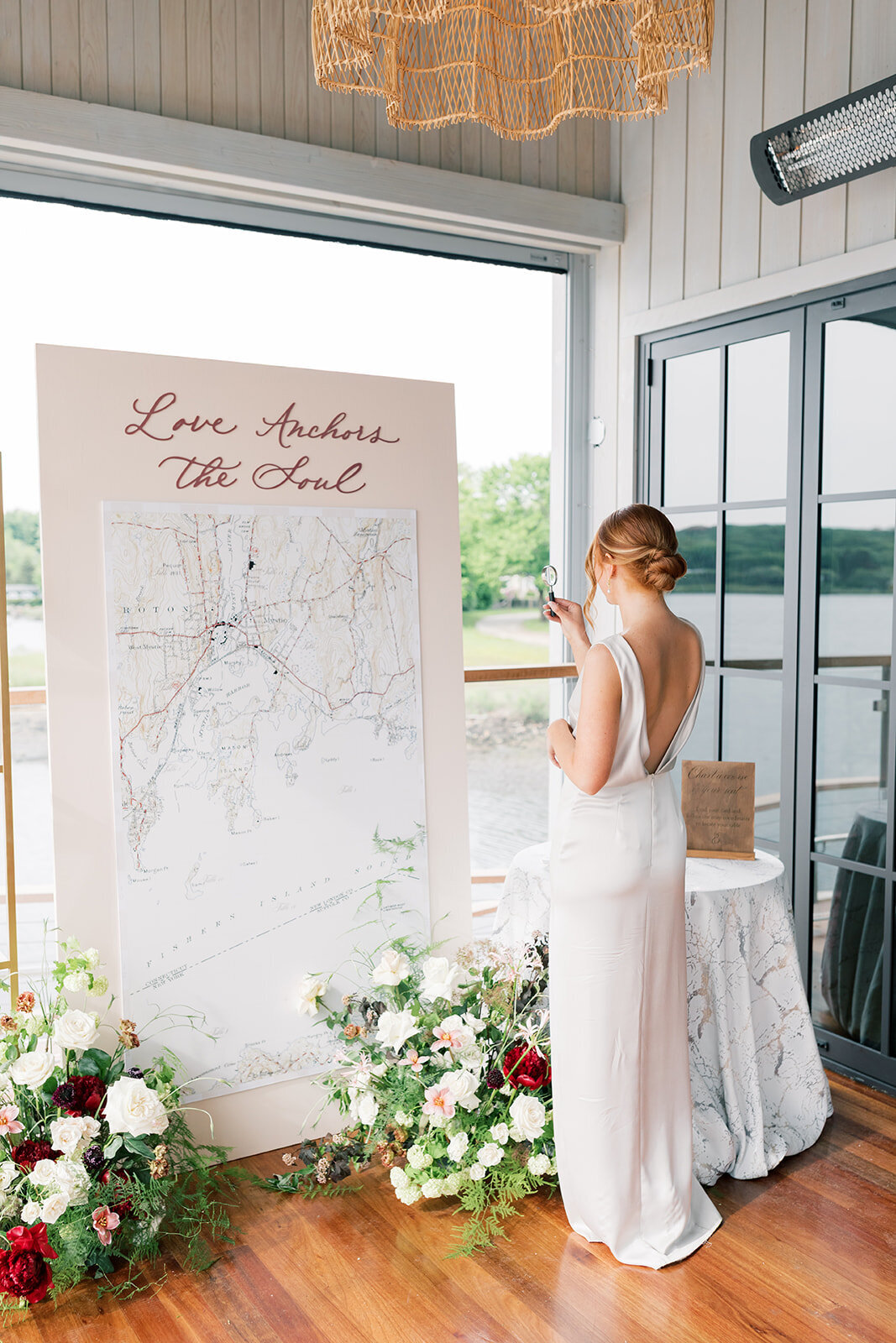 wedding-seating-display-nautical-map-pink
