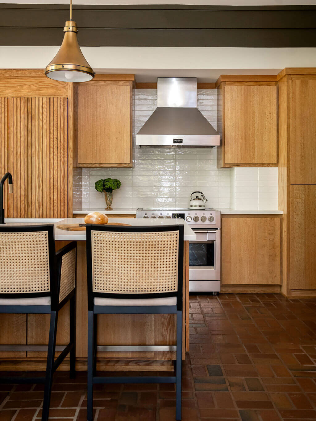 sweet southern home mid mod wooden kitchen with bar stools