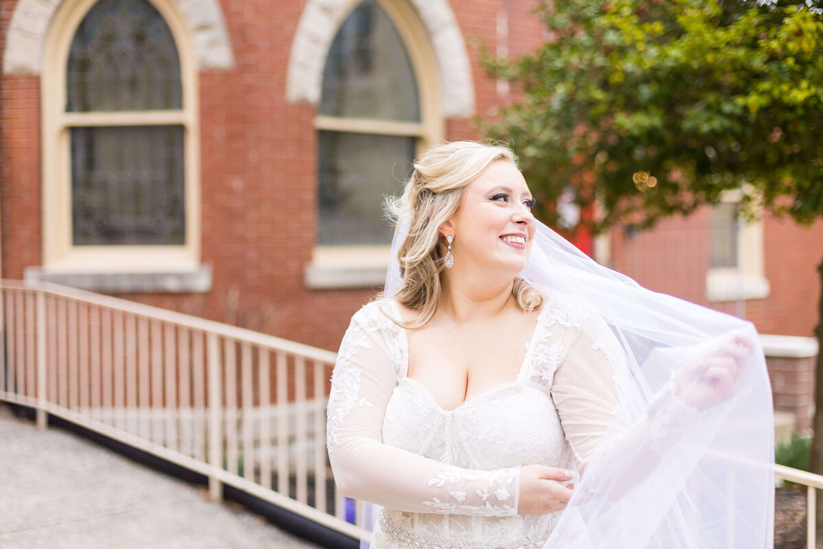 Bride wearing lace dress at  The Gatsby in Shelbyville,KY
