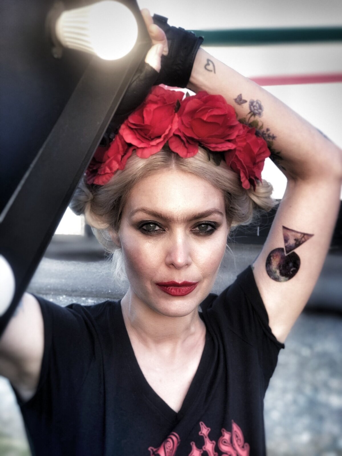 woman-flower-headpiece-tattoos-smoky-eye-makeup-film-television