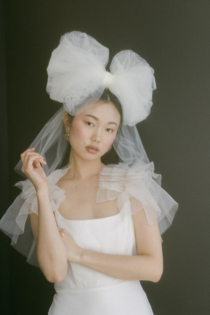 Vintage inspired short tulle bow veil by Blair Nadeau Bridal Adornments, romantic and modern wedding jewelry based in Brampton.  Featured on the Brontë Bride Vendor Guide.