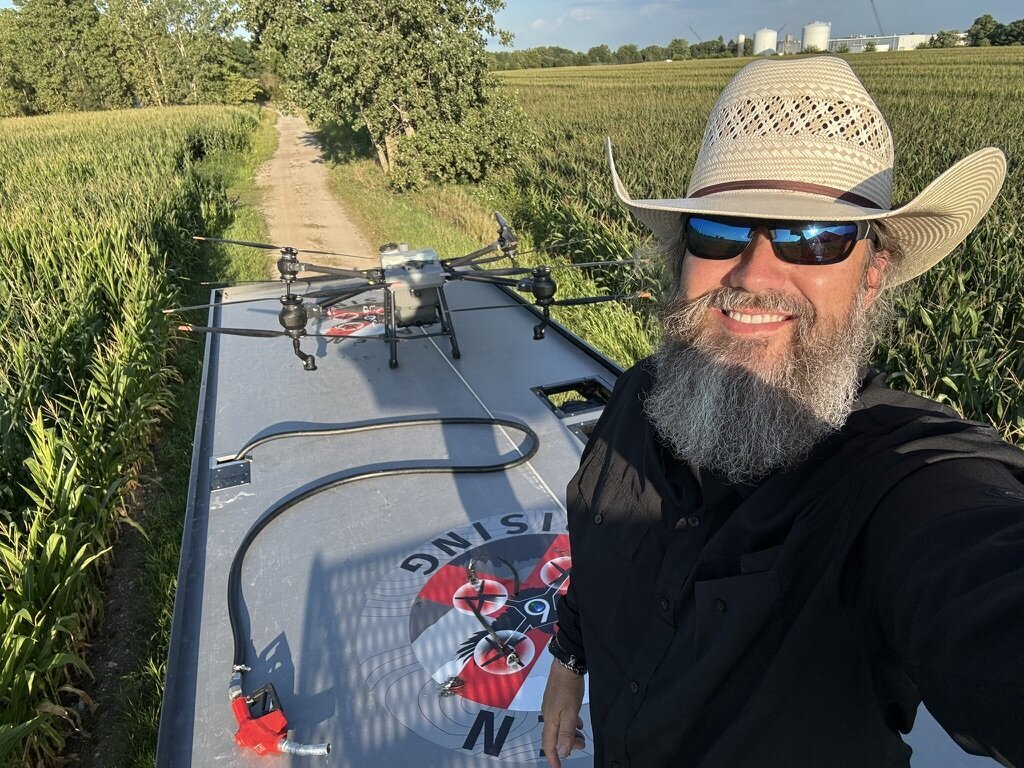 Raven 6 Rising's founder Jason Miller flying agriculture drones in Indiana