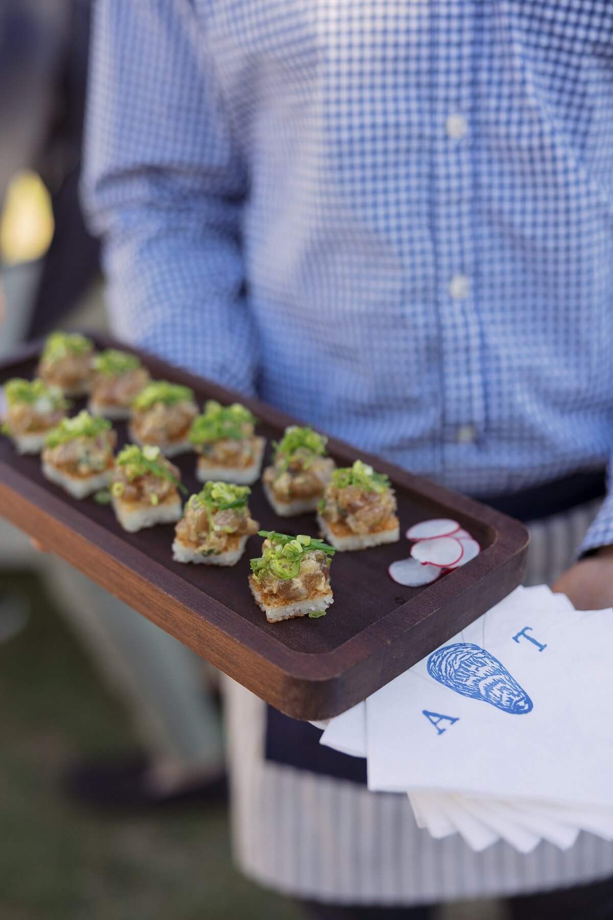 A tray of passed appetizers during Nantucket wedding reception.