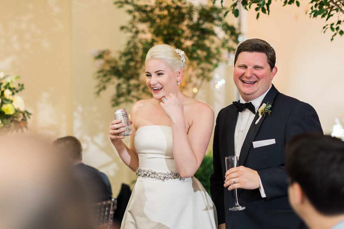 Photojournalism at its best during this couples reception at the Atlanta History Center. Photo by luxury destination wedding photographer Rebecca Cerasani.