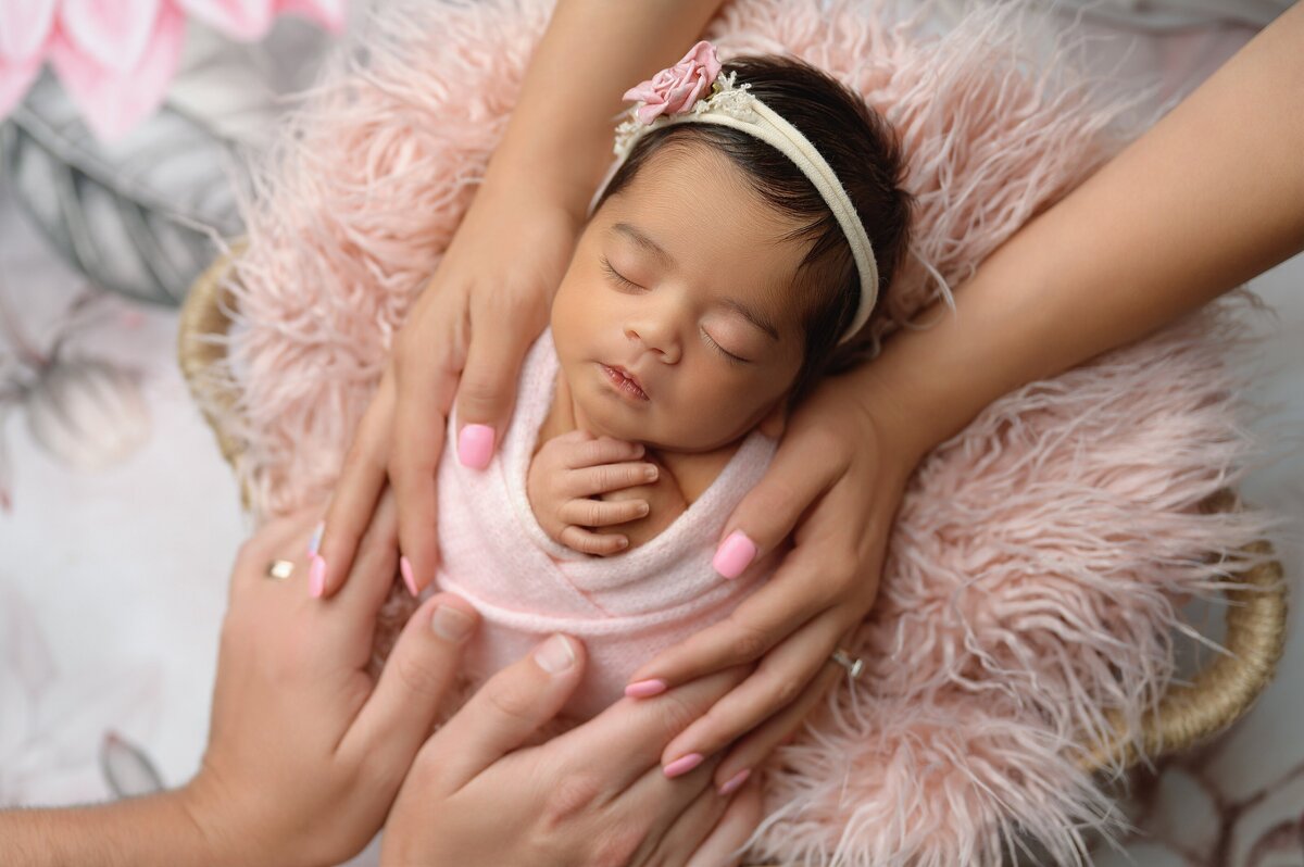 West Lake Worth photographer  provides creative newborn poses in studio.