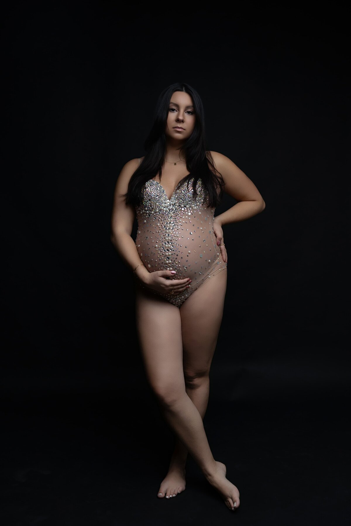 pregnant mom posing in studio