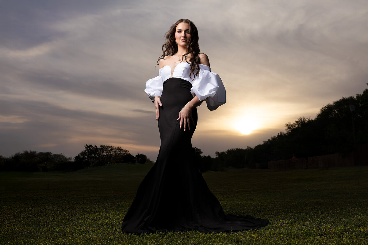 Sunset senior photo session with a formal gown by one of the top senior photographers Dallas TX.