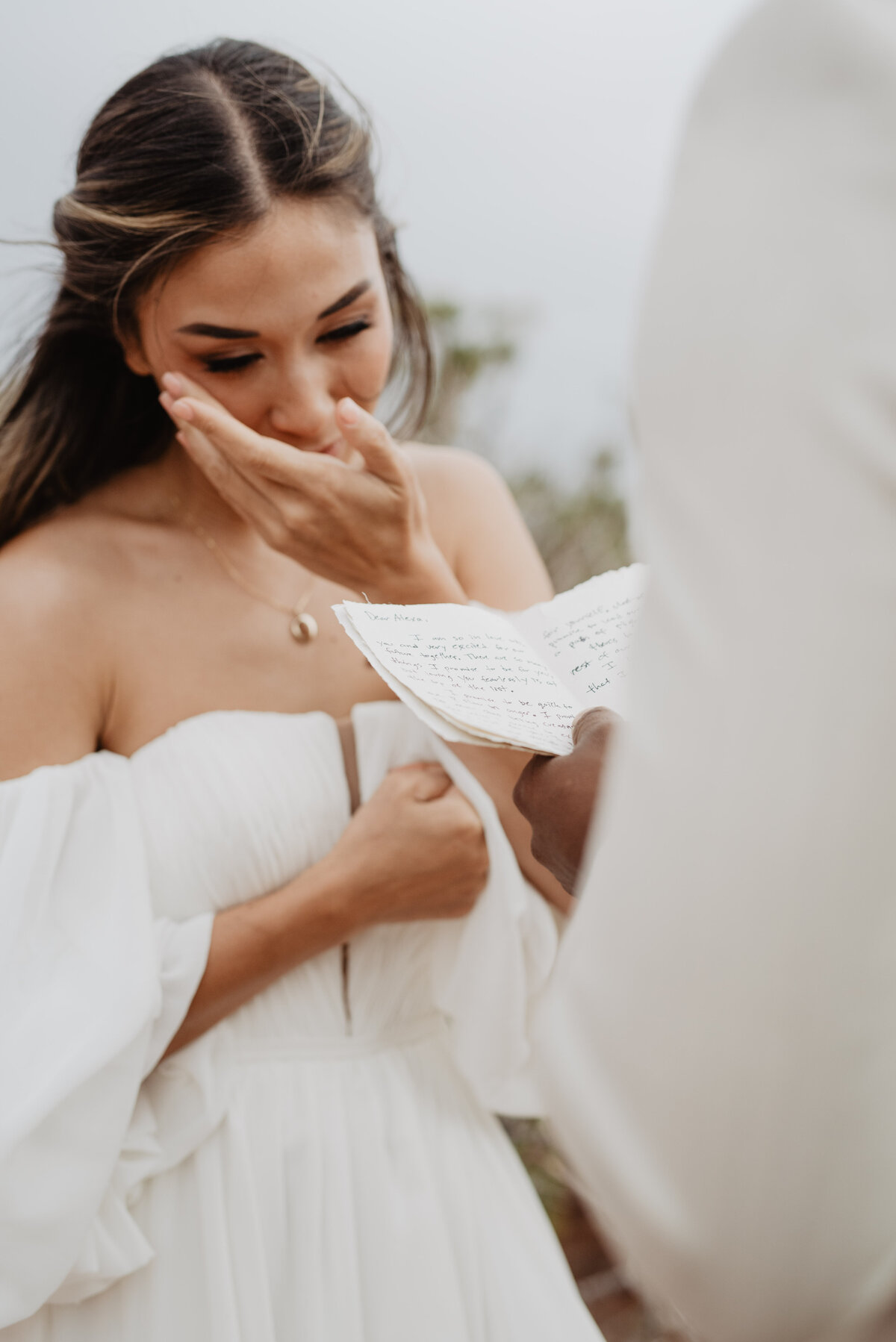 Utah Elopement Photographer captures woman wiping tears