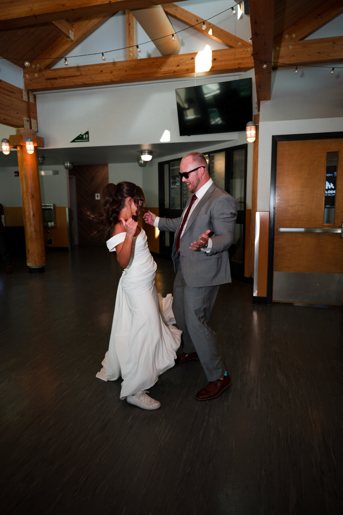 bride and groom celebrating wedding reception