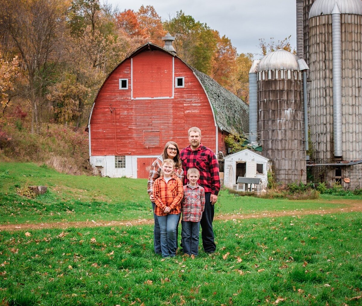 family by barn