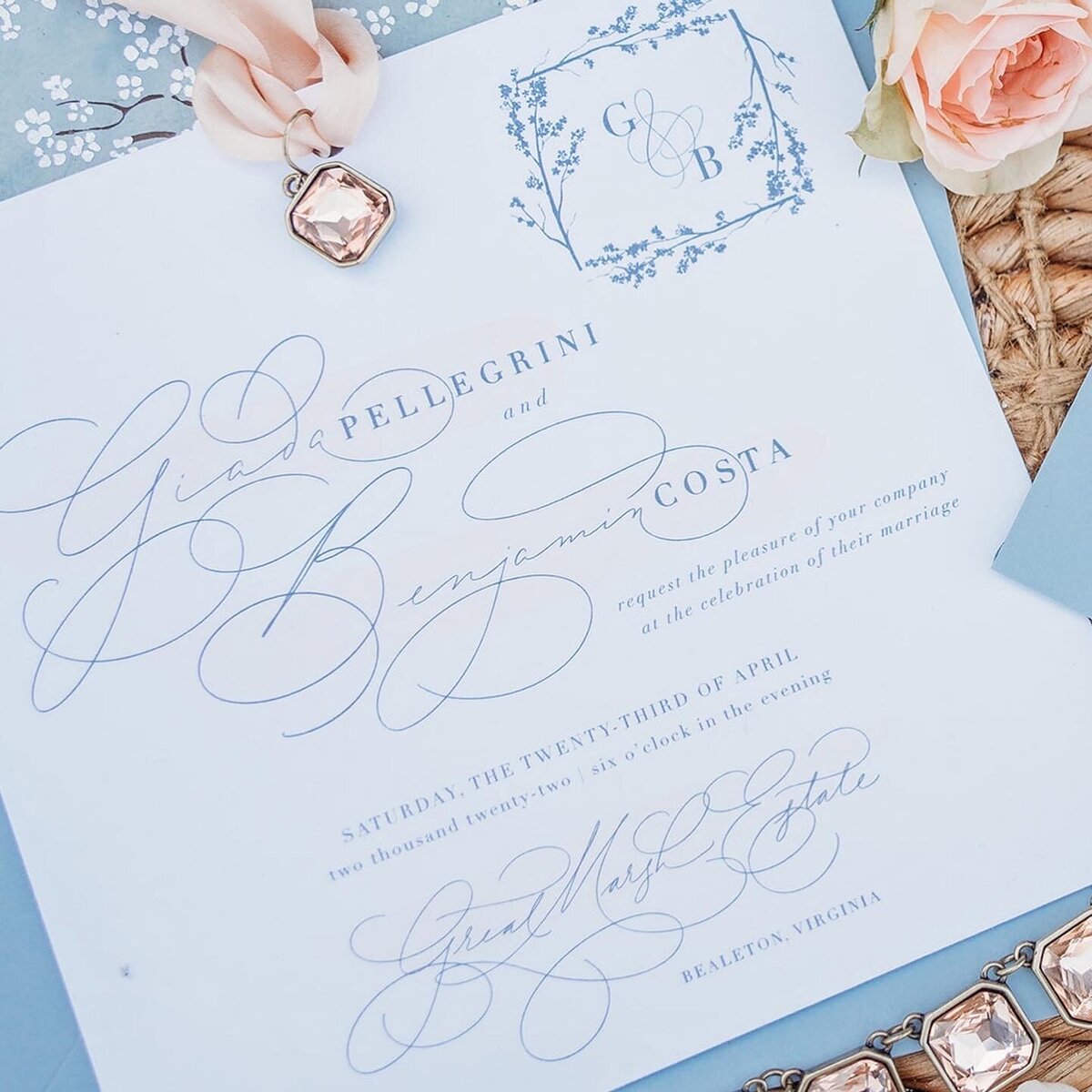Clean wedding invitation with custom calligraphy