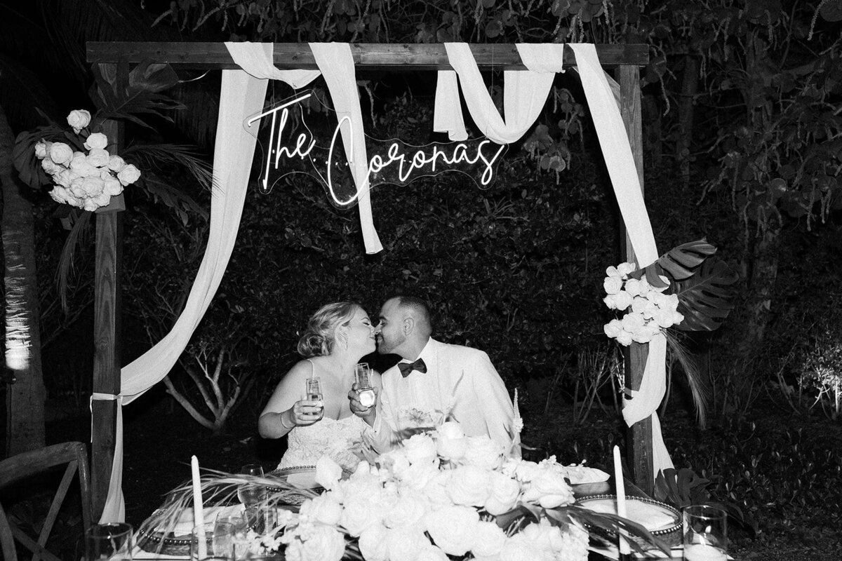 Romantic black-and-white moment of Kelly and Rafael at their La Siesta Marina wedding.