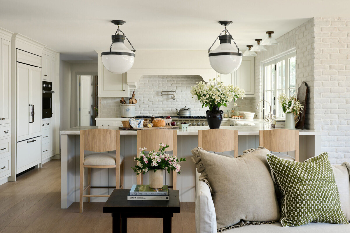 example of a Newport Beach kitchen interior design with light colors, natural lighting and materials, with a modern simplistic flair