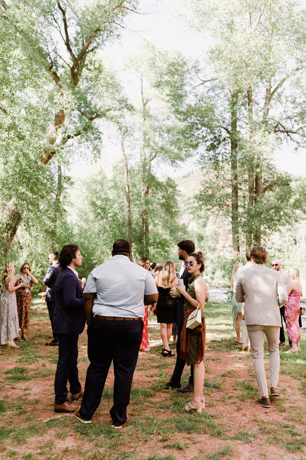 Guests mingling at wedding at Dallenbach Ranch Colorado Wedding