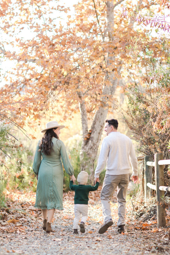 san-diego-photography-parents-walking-with-son-mission-trails