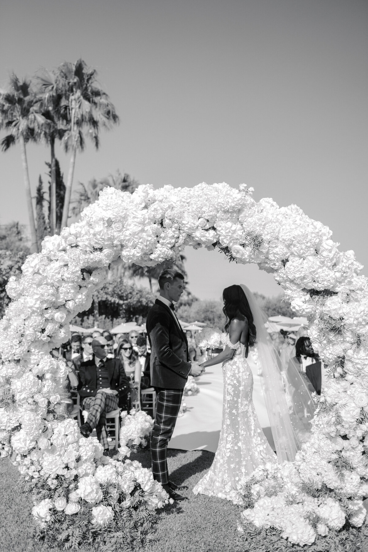luxury white flower arch at son mir wedding