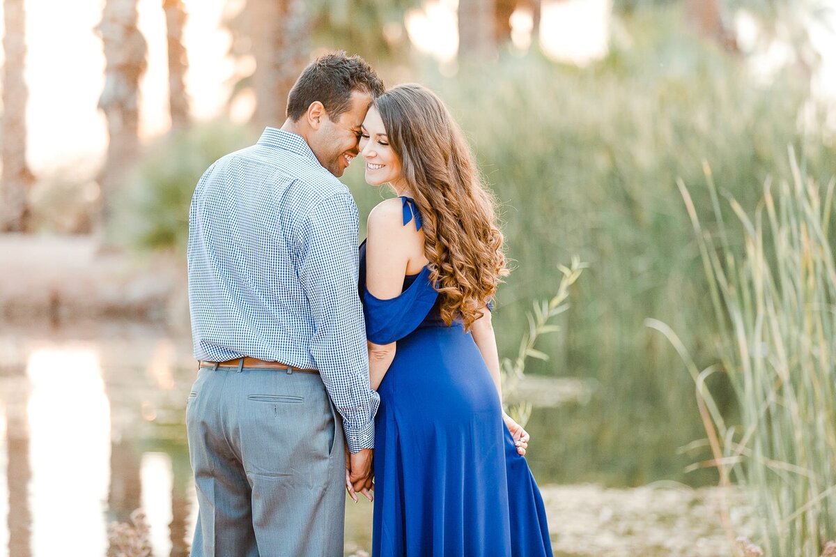 engaged-couple-with-blue-dress