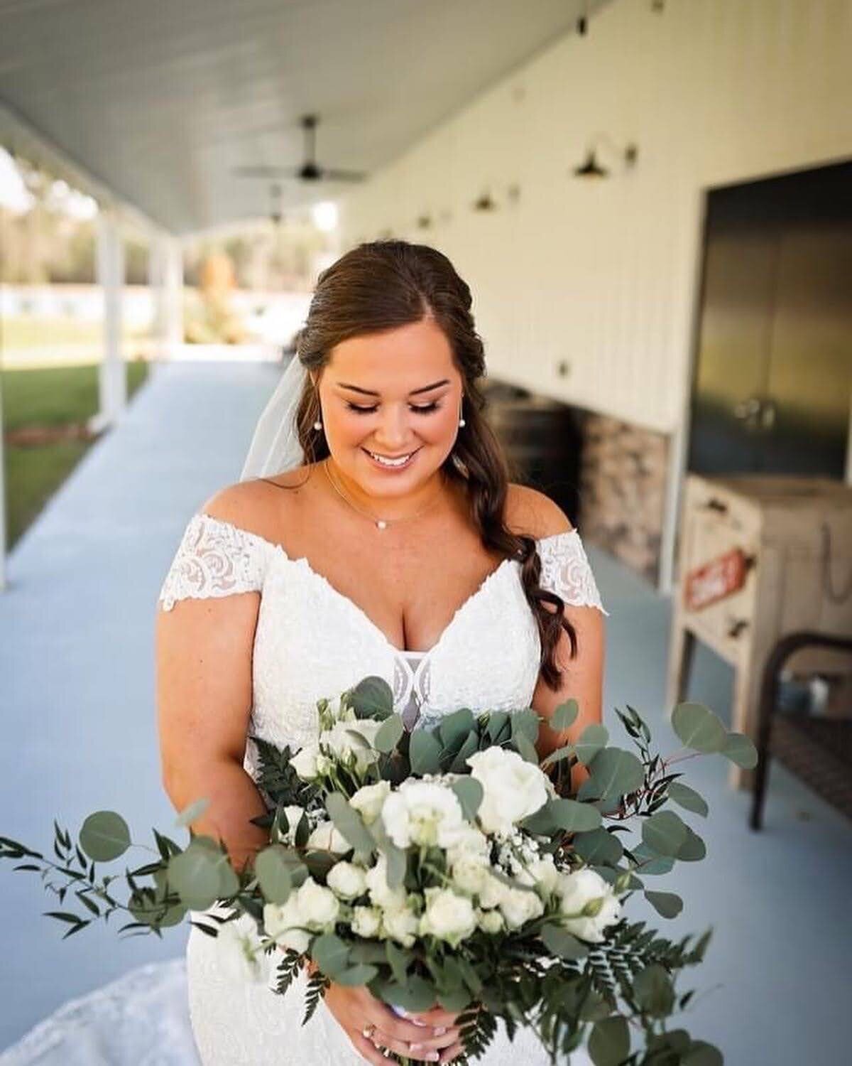 Houston makeup artist collaborating with a talented bridal team to create a personalized beauty plan for a bride-to-be.