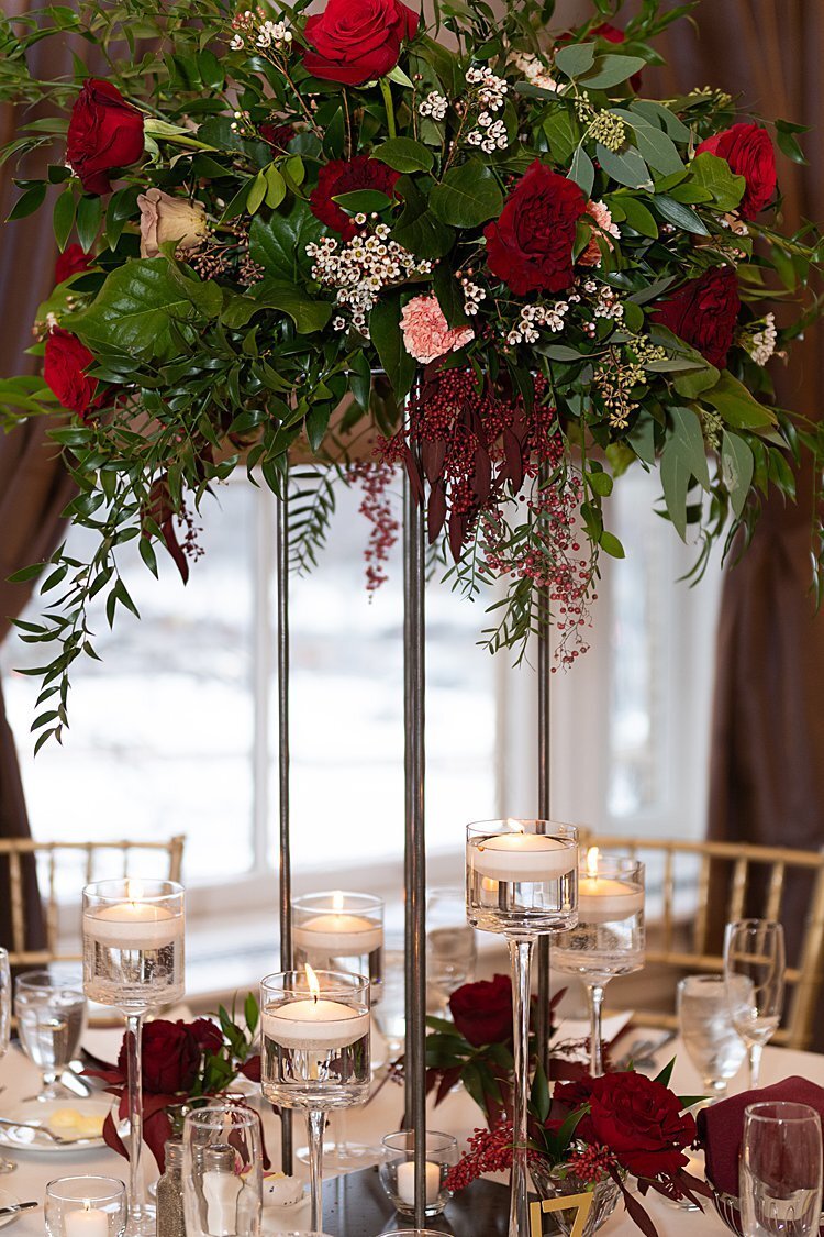 Tall floral centerpiece with red, blush, pink and off-white flowers at University Club in Pittsburgh, PA