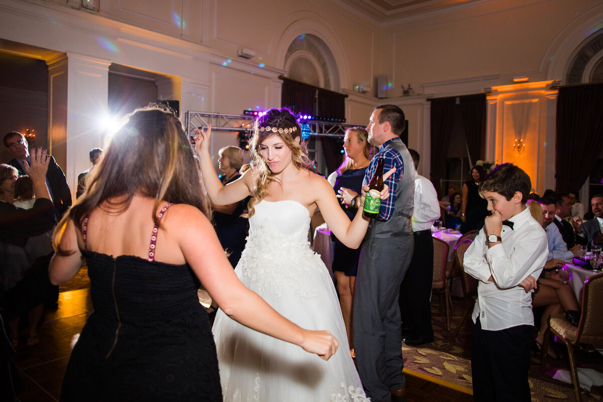 bride dancing on the ballroom dance floor during wedding recepton