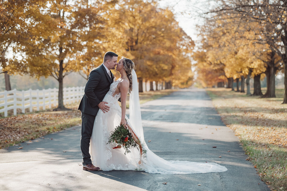 couple on their wedding day in the fall
