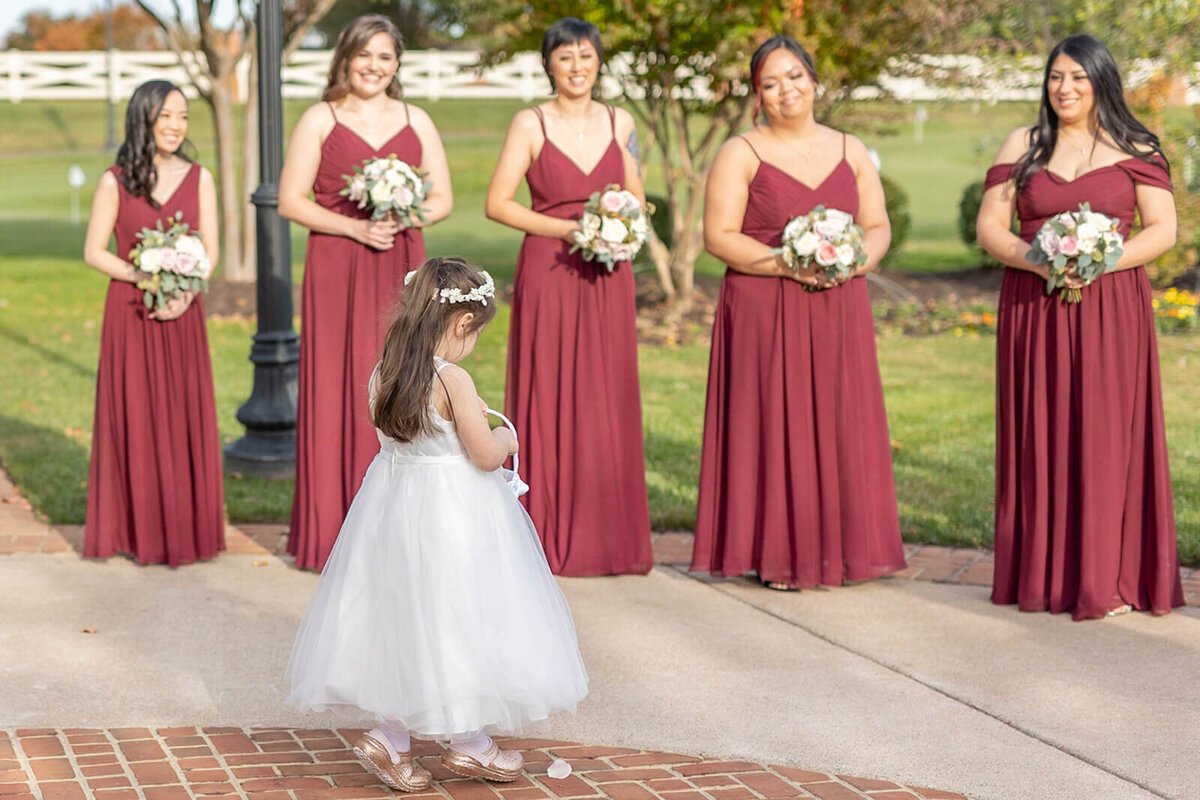 bridesmaids in burgundy gowns