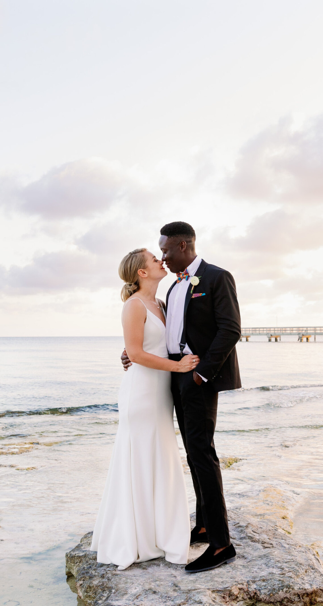 Elegant couple at their Key Largo lighthouse beach wedding, photographed by Claudia Amalia.