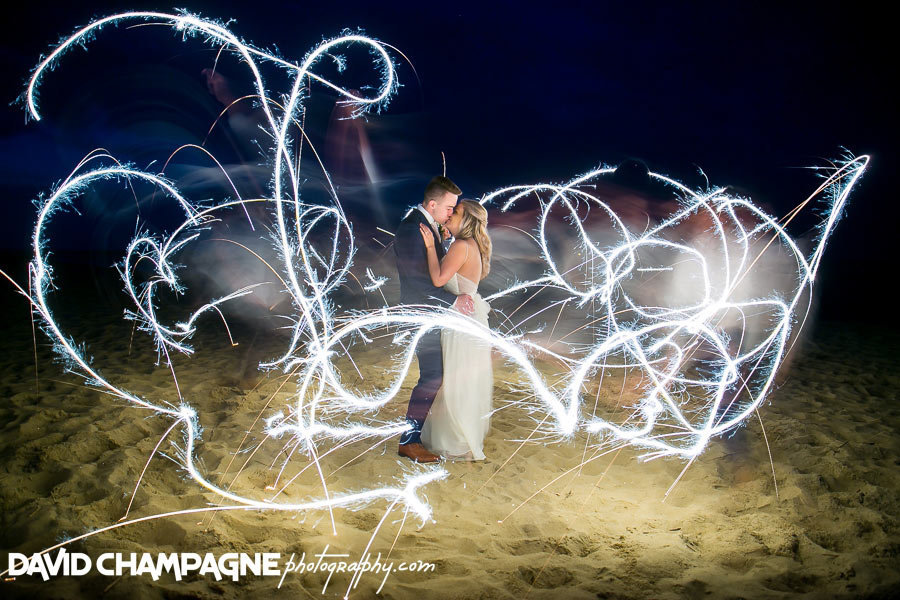 Bride & Groom with sparklers on the beach at Sandbridge