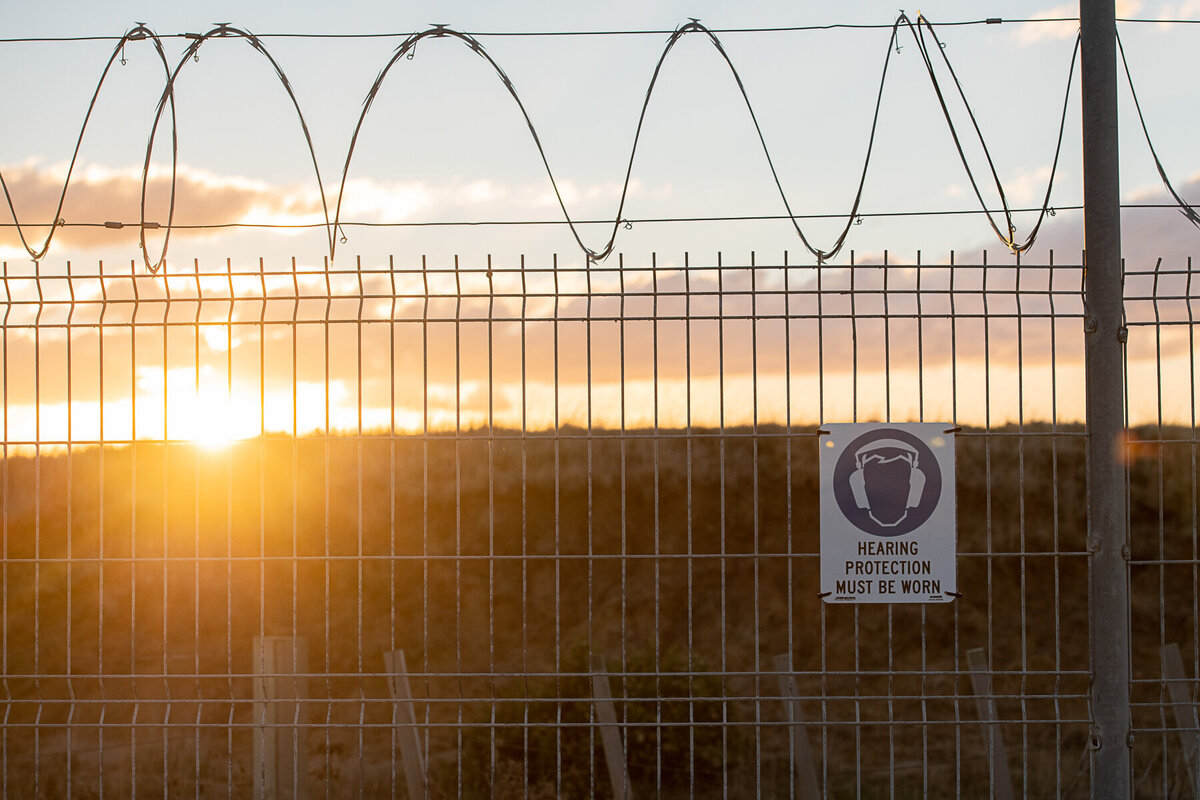 Sunset Through the Rocketlab LC1 Security Fence