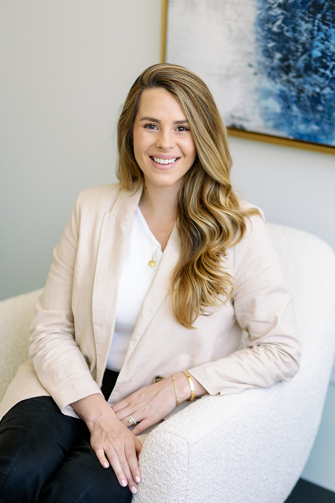Therapist smiling softly during professional headshot in Weatherford.