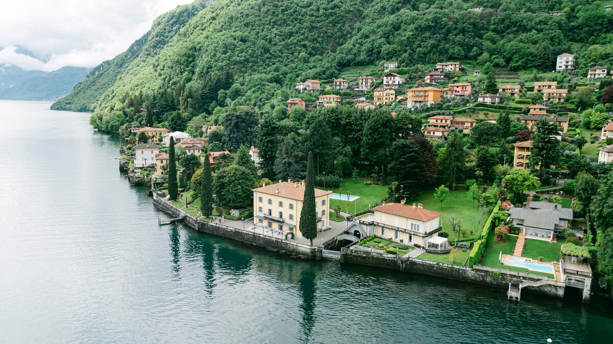 A wedding day drone photo of villa aura del lago on lake como in Italy