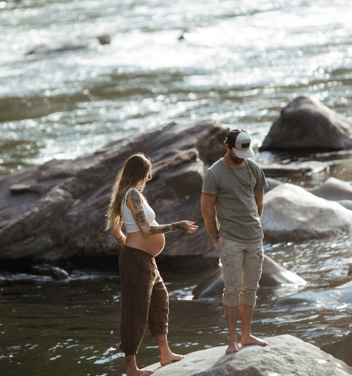 Couple during golden hour engagement and maternity shoot in Riggins, Idaho wedding/elopement - photographed by The Storytellers