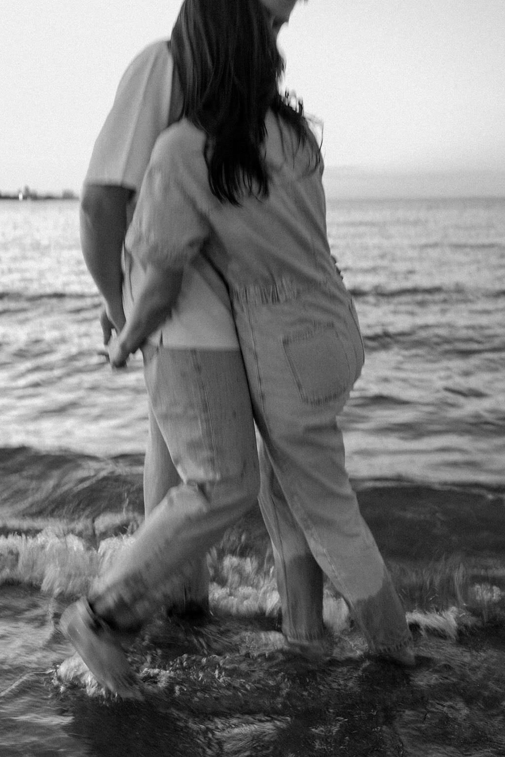 An engagement photography session at The Wrigley Building and North Ave Beach in Chicago, Illinois - 42