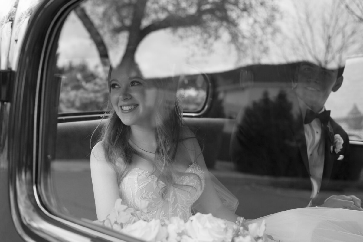 bride in vintage car at The Broadmoor Resort in Colorado Springs, Colorado