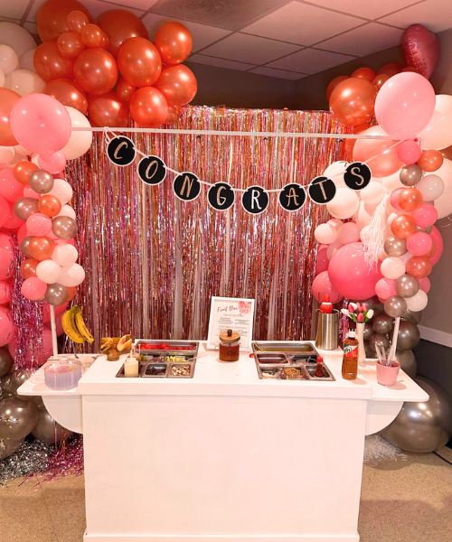 Fruit bar setup for pink-themed party
