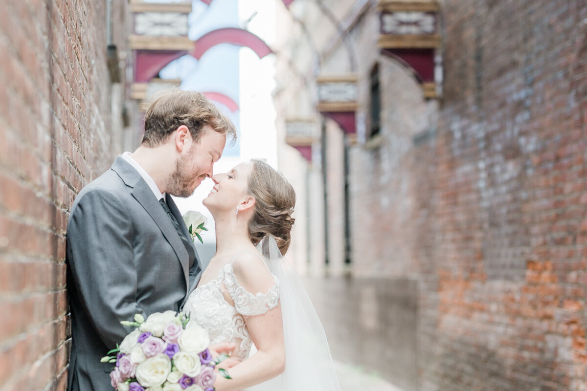 Light and airy wedding portrait of couple in an ally on Jay street in Schenectady, NY