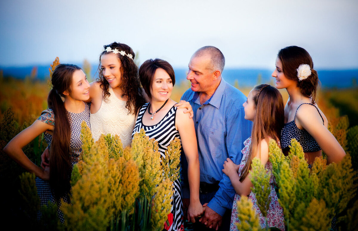 family in cropping field in Central Queensland