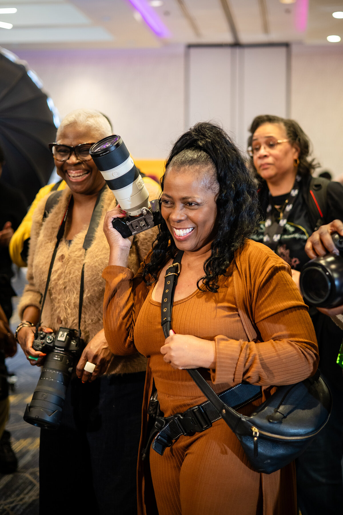 Celebrity Boudoir photographer Katrina Cross Daniels enjoying moments during the photowalk at Peculiar Conference 2024