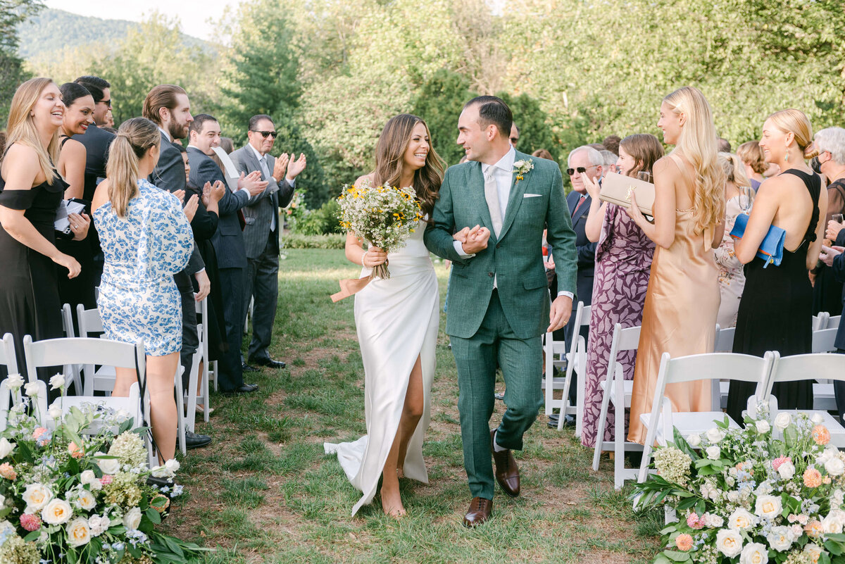 Bride and Groom at the Wildflower Chic Wedding Ceremony at the Clifton in Charlottesville Virginia=. Planning and Design by Howerton+Wooten Events; Photography by Stephanie Whitehill Photography
