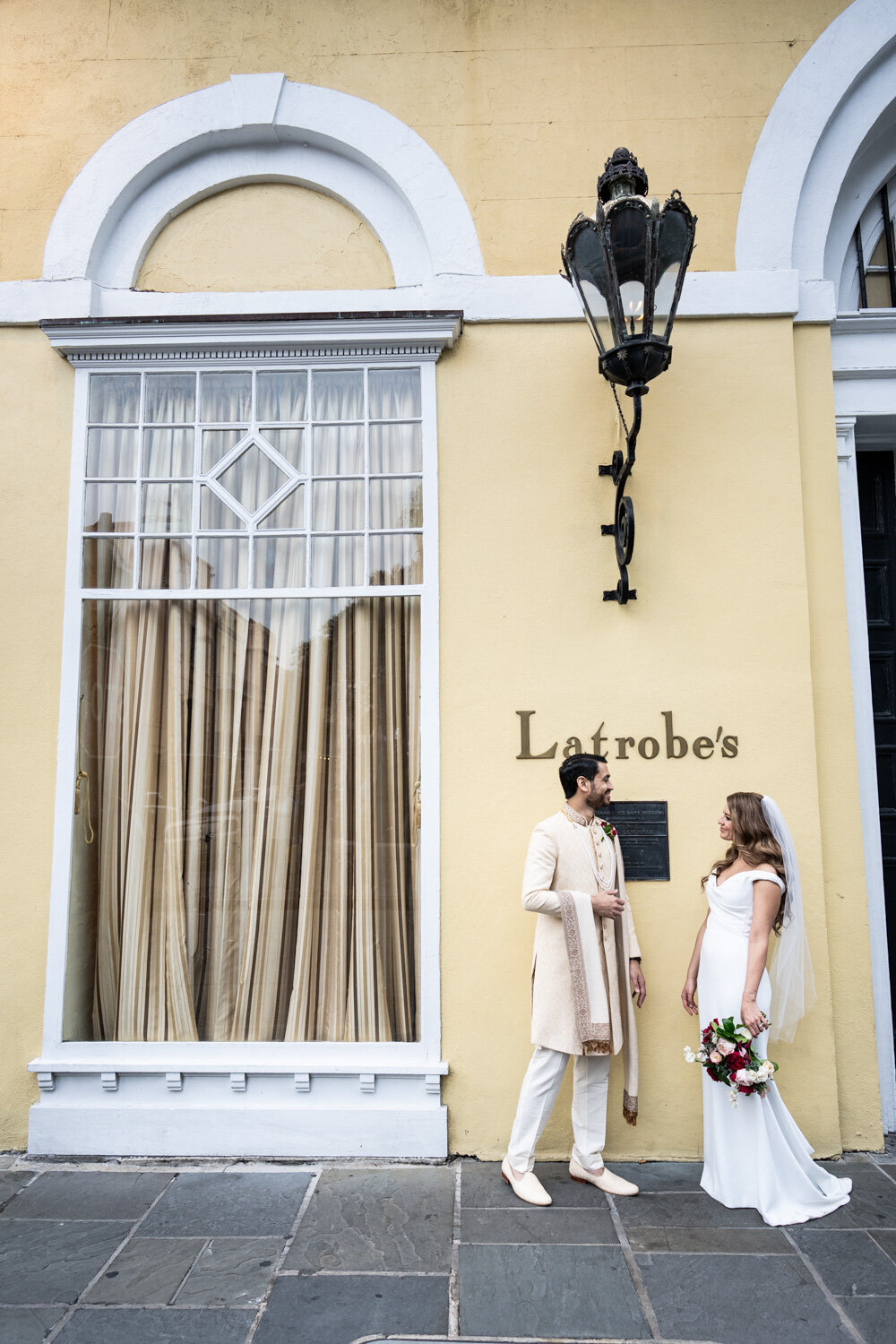 Bride and groom in front of Latrobe's building