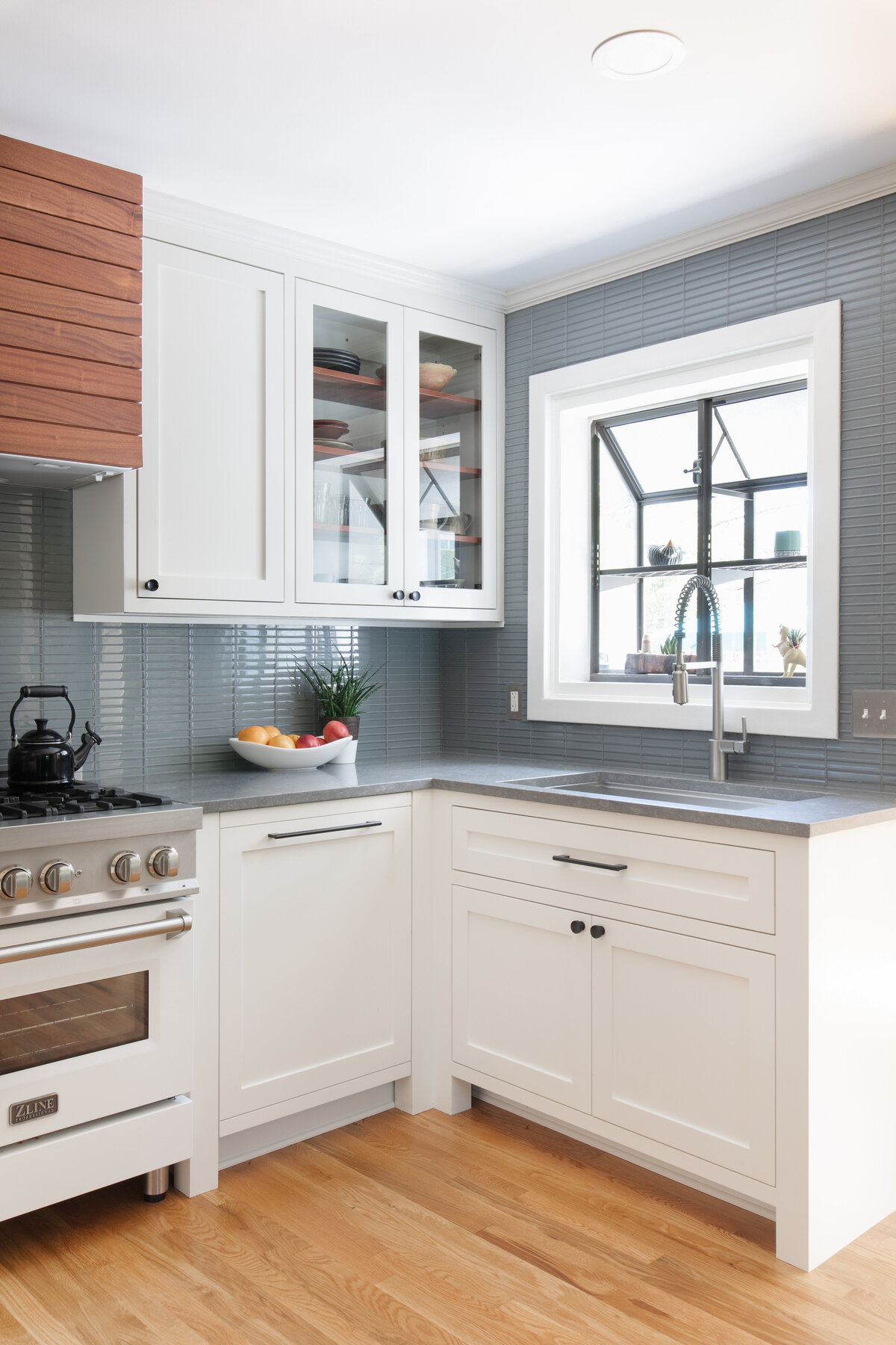 hello-home-open-contemporary-kitchen-remodel-wood-vent-hood-blue-grey-backsplash-austin-4