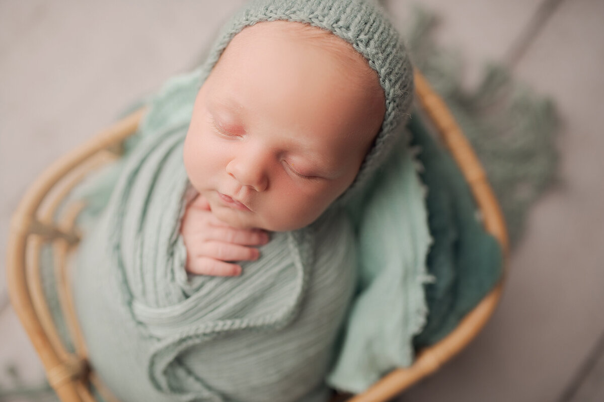 Wrapped newborn photos in green color, Katie Anne photographer Oregon