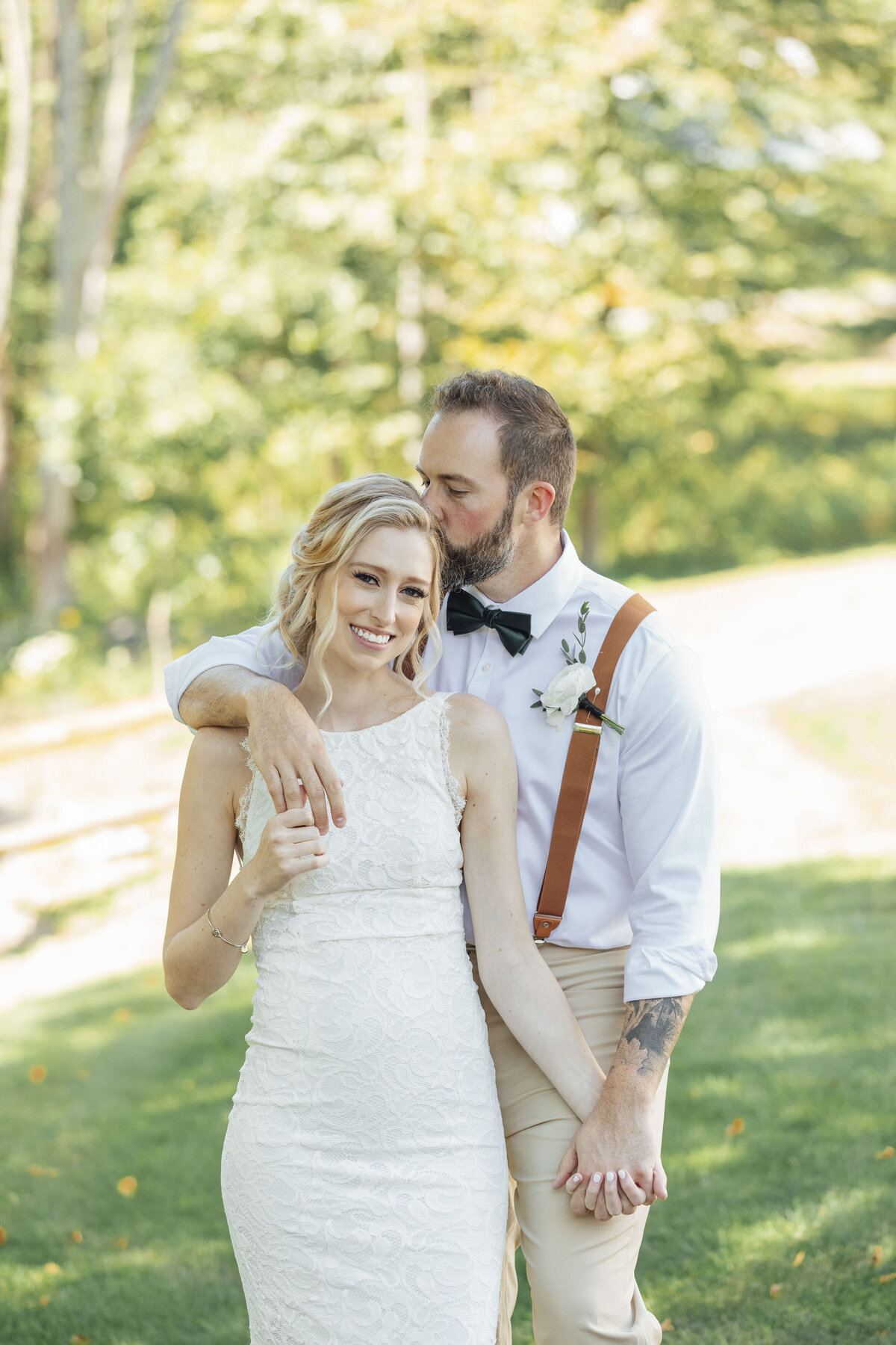 wagar-farm-summer-wedding-photo-groom-kissing-bride-forehead-ellenville-new-york