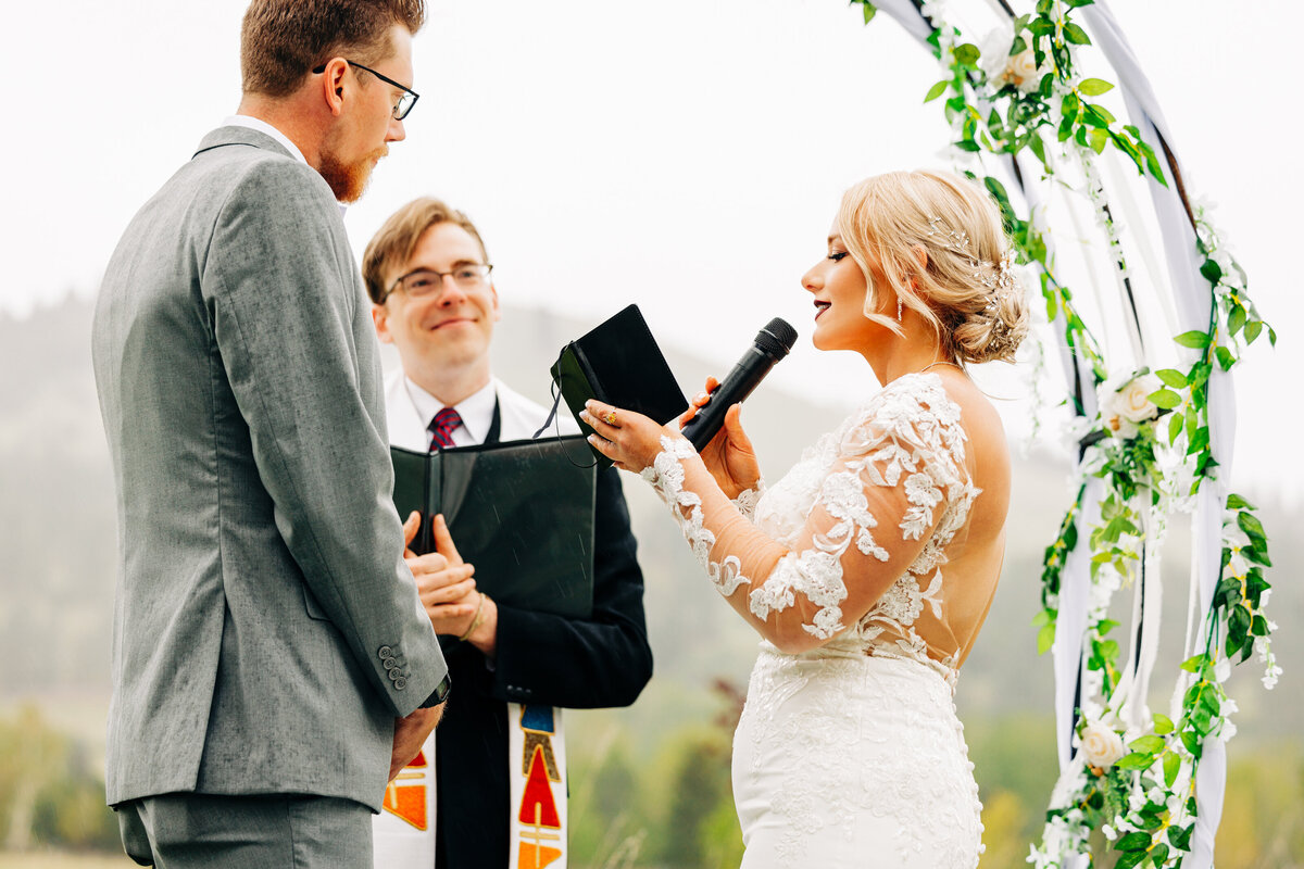 Bride reciting vows at Ten Spoon Winery in Missoula, MT