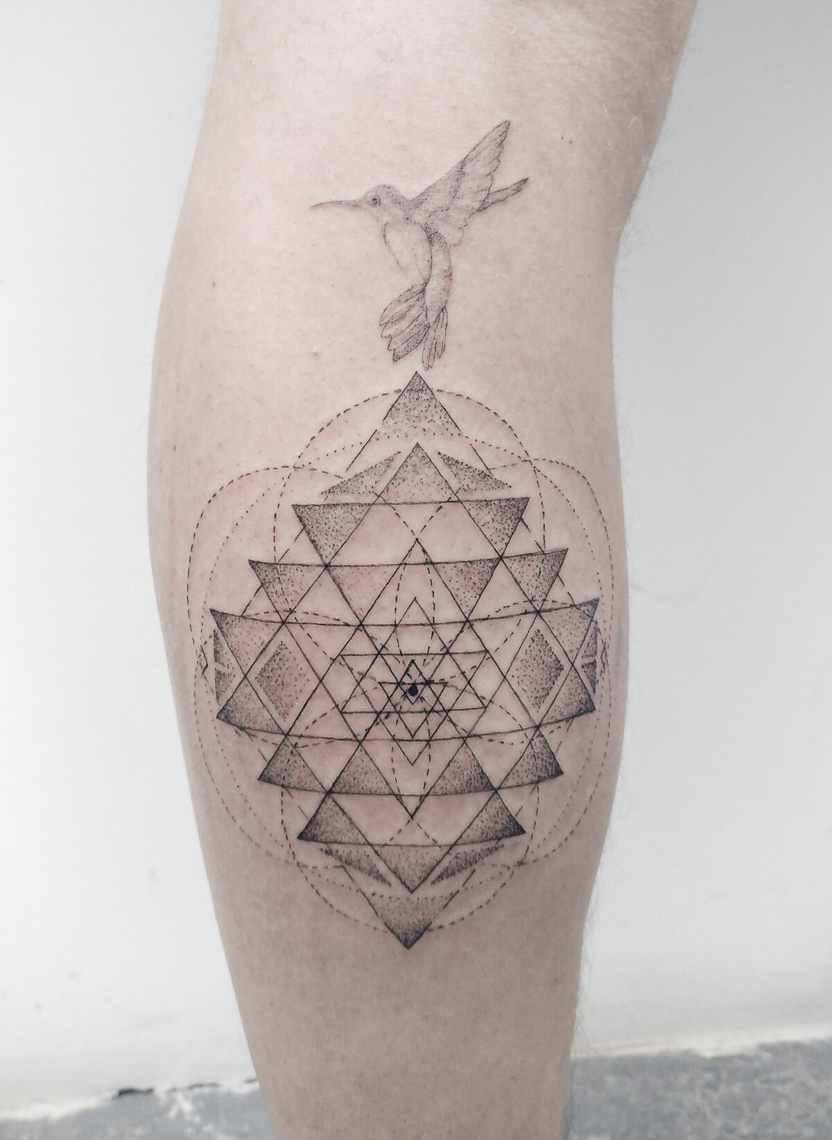 sri yantra tattoo, hummingbird tattoo, geometric tattoo, dotwork tattoo